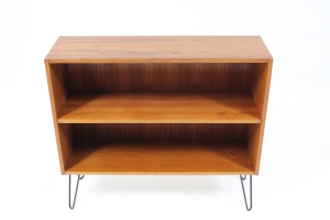 Article #: CZ2016324 Designer: Unidentified Producer: Unidentified Model: Unidentified Year: 1960’s Dimensions: H 77 W 87,5 D 27 cm Origin: Denmark Location: Central warehouse, Czechia Price: € 270   Original medium shelf rack / bookcase in teak featuring adjustable shelf inside. The item has been redesigned with minimalist iron leg base. Carefully restored, very good condition.